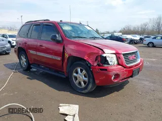 2005 GMC Envoy SLE with VIN 1GKDT13S252127604, listed as a IAAI auction lot 41898390 with 210,655 mi miles. Bid and sale history available at carsss.com. Image 1.