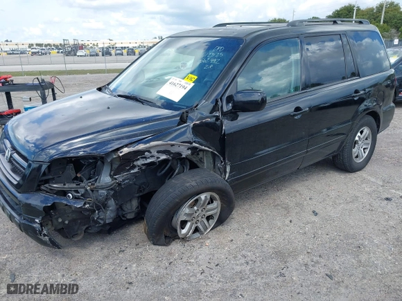 2005 Honda Pilot EX-L with NAVI with VIN 2HKYF18715H562492, listed as a IAAI auction lot 41627194 with 184,653 mi miles. Bid and sale history available at carsss.com. Image 17.
