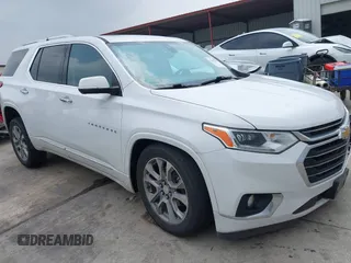 2021 Chevrolet Traverse Premier with VIN 1GNERKKW2MJ182543, listed as a IAAI auction lot 42195293 with 87,000 mi miles and . Bid and sale history available at DreamBid. Image 1.