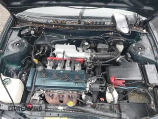 1997 Toyota Corolla with VIN 2T1BA02E2VC211034, listed as a IAAI auction lot 42253359 with 201,451 mi miles and . Bid and sale history available at DreamBid. Image 10.