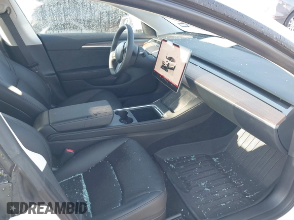2023 Tesla Model 3 Long Range with VIN 5YJ3E1EB6PF633550, listed as a IAAI auction lot 41861278 with 45,743 mi miles and . Bid and sale history available at DreamBid. Image 5.