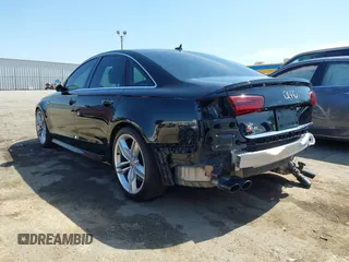 2016 Audi S6 Prestige z VIN WAUH2AFC6GN130251, wystawiony jako IAAI lot #41912382 z przebiegiem 72 512 mil mil oraz . Historia ofert i sprzedaży dostępna na DreamBid. Obrazek 3.
