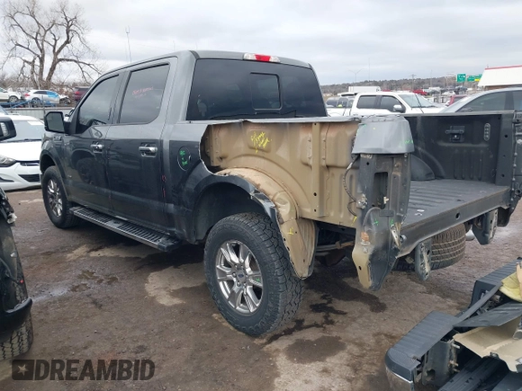 2015 Ford F-150 XLT with VIN 1FTEW1EG8FKE38679, listed as a IAAI auction lot 41526976 with 137,000 mi miles. Bid and sale history available at carsss.com. Image 3.