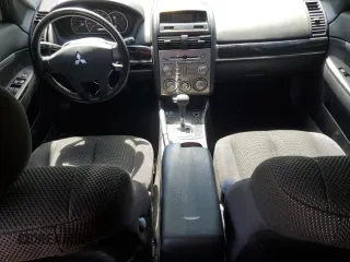 2009 Mitsubishi Galant ES with VIN 4A3AB36F29E008657, listed as a Copart auction lot 52032565 with 144,745 mi miles and Salvage Title. Bid and sale history available at carsss.com. Image 8.