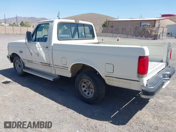 1990 Ford F-150 with VIN 2FTDF15N6LCA44303, listed as a IAAI auction lot 41981297 with 63,097 mi miles. Bid and sale history available at carsss.com. Image 3.