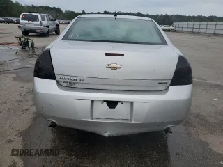 2014 Chevrolet Impala LT with VIN 2G1WB5E33E1165713, listed as a Copart auction lot 60591585 with 203,323 mi miles and Salvage title. Bid and sale history available at DreamBid. Image 6.