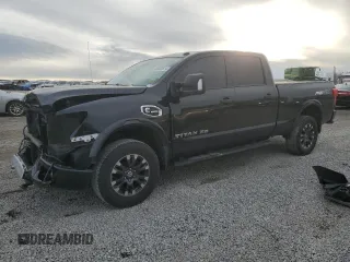 2019 Nissan Titan XD SV with VIN 1N6BA1F44KN509470, listed as a Copart auction lot 85030514 with 56,800 mi miles and Salvage Title. Bid and sale history available at carsss.com. Image 1.