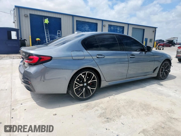 2022 BMW 5 Series 530i with VIN WBA53BH00NWX59634, listed as a Copart auction lot 61598505 with 69,130 mi miles and Salvage title. Bid and sale history available at DreamBid. Image 3.