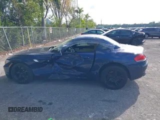 2009 BMW Z4 sDrive35i with VIN WBALM73579E165199, listed as a IAAI auction lot 41696215 with 1 mi miles. Bid and sale history available at carsss.com. Image 14.