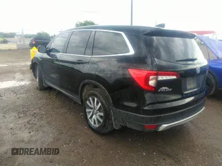2021 Honda Pilot EX-L with VIN 5FNYF5H50MB011165, listed as a IAAI auction lot 39799892 with 95,040 mi miles and . Bid and sale history available at DreamBid. Image 3.