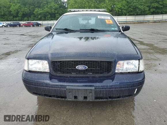 2011 Ford Police Interceptor with VIN 2FABP7BV8BX160188, listed as a Copart auction lot 59710915 with 142,316 mi miles and Salvage title. Bid and sale history available at DreamBid. Image 5.