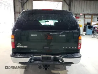 2003 Chevrolet Tahoe LS z VIN 1GNEC13Z23R264941, wystawiony jako Copart lot #56033135 z przebiegiem 195 068 mil mil oraz Szkoda całkowita • Salvage title. Historia ofert i sprzedaży dostępna na DreamBid. Obrazek 6.