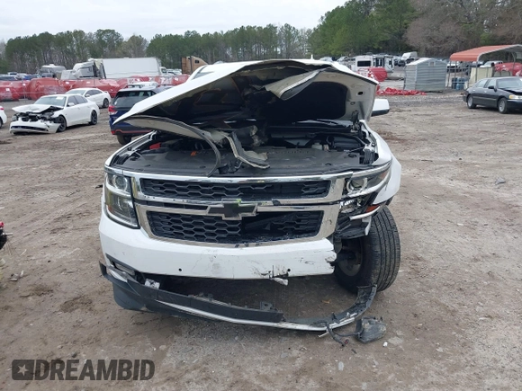 2020 Chevrolet Tahoe LT with VIN 1GNSKBKC2LR253012, listed as a IAAI auction lot 41870002 with 127,789 mi miles and . Bid and sale history available at DreamBid. Image 12.