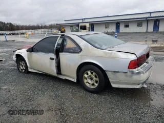 1990 Ford Thunderbird with VIN 1FAPP6046LH182637, listed as a Copart auction lot 82300484 with 149,365 mi miles and Salvage Title. Bid and sale history available at DreamBid. Image 2.