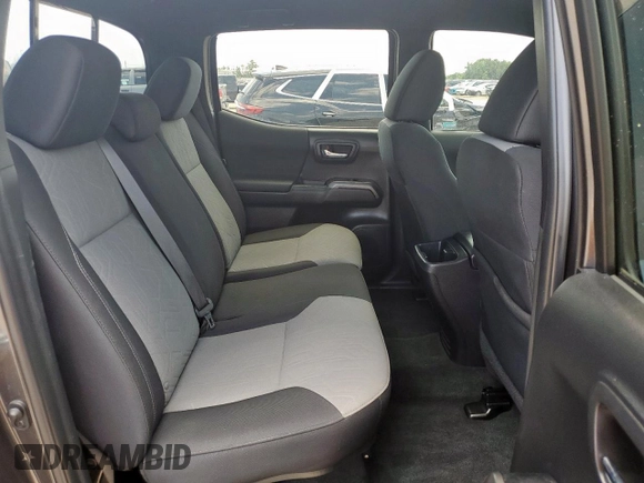 2023 Toyota Tacoma SR z VIN 3TMCZ5AN5PM598443, wystawiony jako Copart lot #60485035 z przebiegiem 18 842 mil mil oraz Szkoda całkowita • Salvage title. Historia ofert i sprzedaży dostępna na DreamBid. Obrazek 11.
