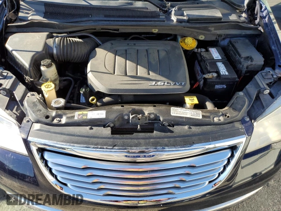 2014 Chrysler Town & Country Touring with VIN 2C4RC1BG2ER256457, listed as a Copart auction lot 70687244 with 179,893 mi miles and Salvage Title. Bid and sale history available at DreamBid. Image 12.