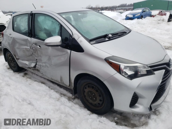 2015 Toyota Yaris L with VIN VNKKTUD30FA018469, listed as a Copart auction lot 47103985 with 126,060 mi miles and Salvage Title. Bid and sale history available at DreamBid. Image 4.