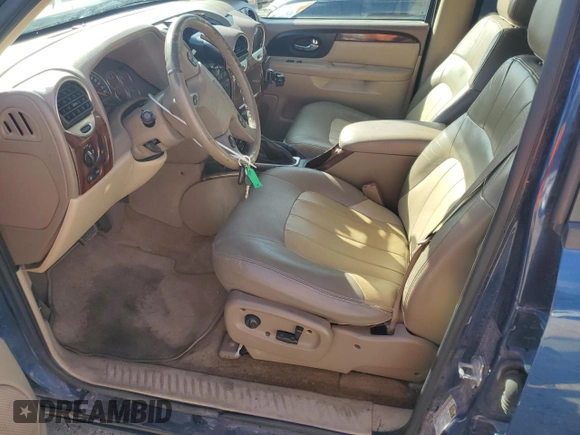 2004 GMC Envoy SLT with VIN 1GKDS13S042311327, listed as a Copart auction lot 42736995 with 235,164 mi miles and Salvage Title. Bid and sale history available at carsss.com. Image 7.