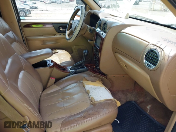 2003 GMC Envoy SLE with VIN 1GKES16S136153880, listed as a IAAI auction lot 42009798 with 289,208 mi miles and . Bid and sale history available at DreamBid. Image 5.