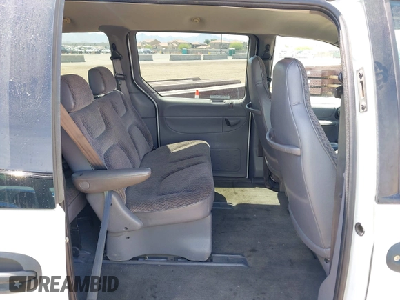 1999 Dodge Caravan with VIN 2B4FP2534XR161940, listed as a IAAI auction lot 41974872 with 162,035 mi miles and . Bid and sale history available at DreamBid. Image 8.