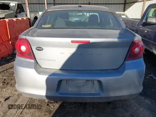 2013 Dodge Avenger SE with VIN 1C3CDZAB4DN590562, listed as a IAAI auction lot 41689241 with 258,167 mi miles and . Bid and sale history available at carsss.com. Image 16.