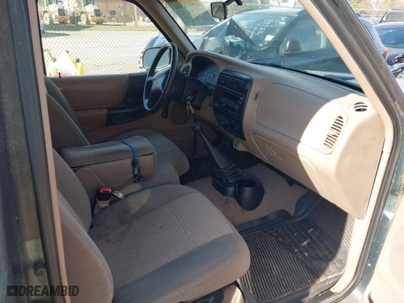 1998 Mazda B-Series 2WD Truck DS with VIN 4F4YR16U2WTM42236, listed as a IAAI auction lot 40971584 with 143,503 mi miles. Bid and sale history available at carsss.com. Image 5.