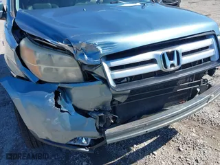 2006 Honda Pilot EX-L with RES with VIN 2HKYF18626H505792, listed as a IAAI auction lot 41861686 with 180,551 mi miles. Bid and sale history available at carsss.com. Image 6.