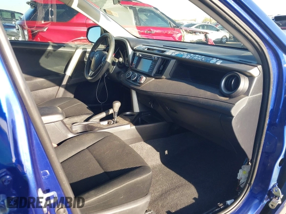 2014 Toyota RAV4 LE with VIN 2T3ZFREV9EW124480, listed as a IAAI auction lot 42579578 with 117,799 mi miles and . Bid and sale history available at DreamBid. Image 5.