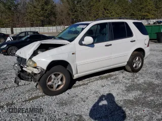 2000 Mercedes-Benz M-Class with VIN 4JGAB54E9YA200992, listed as a Copart auction lot 42613165 with 128,655 mi miles and Salvage Title. Bid and sale history available at carsss.com. Image 1.