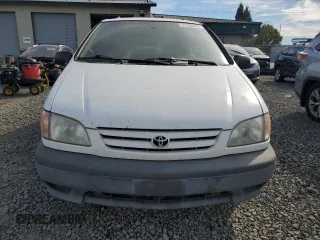 2001 Toyota Sienna LE with VIN 4T3ZF13C61U362980, listed as a Copart auction lot 71986484 with 188,556 mi miles and Salvage Title. Bid and sale history available at carsss.com. Image 5.