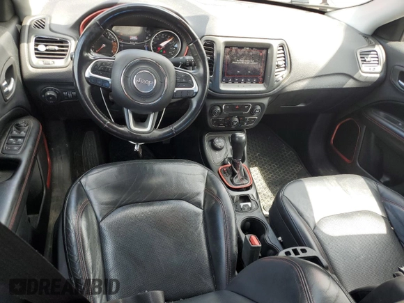 2017 Jeep Compass Trailhawk with VIN 3C4NJDDB7HT657463, listed as a Copart auction lot 60650765 with 100,979 mi miles and Salvage title. Bid and sale history available at DreamBid. Image 8.