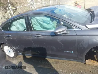2015 Ford Fusion S Hybrid with VIN 3FA6P0UU9FR283189, listed as a IAAI auction lot 41632307 with 152,653 mi miles. Bid and sale history available at carsss.com. Image 14.