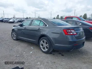 2015 Ford Taurus SEL with VIN 1FAHP2E81FG122378, listed as a IAAI auction lot 42081001 with 159,853 mi miles and . Bid and sale history available at carsss.com. Image 3.