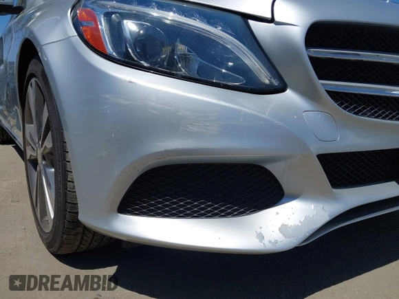 2017 Mercedes-Benz C 300 with VIN 55SWF4JB7HU183618, listed as a IAAI auction lot 42227615 with 72,028 mi miles and . Bid and sale history available at DreamBid. Image 19.