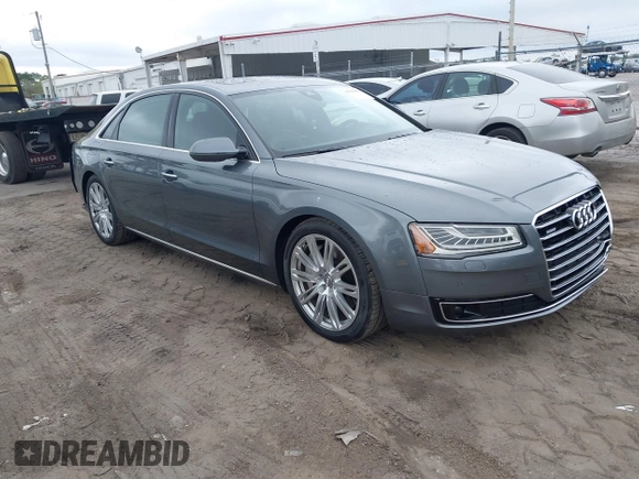 2015 Audi A8 3.0T z VIN WAU3GAFD5FN005065, wystawiony jako IAAI lot #41630450 z przebiegiem 122 939 mil mil oraz . Historia ofert i sprzedaży dostępna na DreamBid. Obrazek 1.
