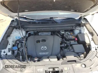 2018 Mazda CX-5 Grand Touring z VIN JM3KFBDM1J0473754, wystawiony jako Copart lot #60362245 z przebiegiem 72 792 mil mil oraz Szkoda całkowita • Salvage title. Historia ofert i sprzedaży dostępna na DreamBid. Obrazek 12.