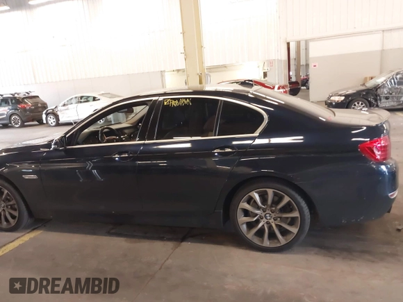 2014 BMW 5 Series 535i with VIN WBA5B1C54ED477539, listed as a IAAI auction lot 40812585 with 94,541 mi miles and . Bid and sale history available at DreamBid. Image 15.