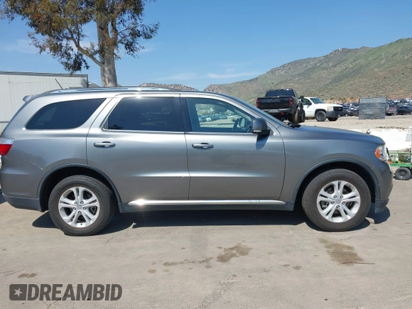 2012 Dodge Durango Crew with VIN 1C4RDHDG2CC317136, listed as a IAAI auction lot 41993837 with 131,048 mi miles and . Bid and sale history available at DreamBid. Image 13.