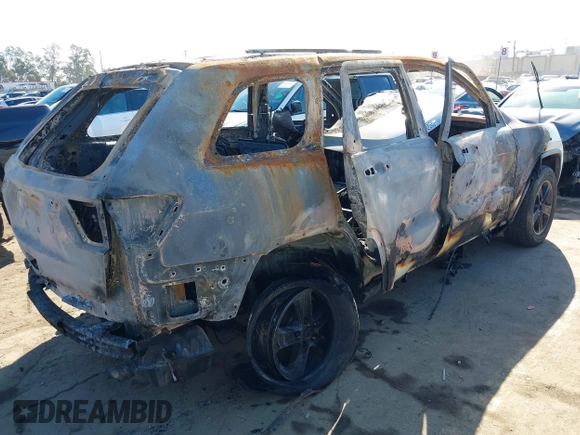 2011 Jeep Grand Cherokee Laredo with VIN 1J4RS4GG2BC618072, listed as a IAAI auction lot 38619850 with Not Provided miles and . Bid and sale history available at DreamBid. Image 4.