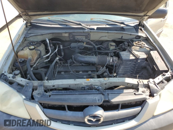 2004 Mazda Tribute DX with VIN 4F2YZ02B74KM13874, listed as a Copart auction lot 65422864 with 288,215 mi miles and Salvage Title. Bid and sale history available at carsss.com. Image 12.