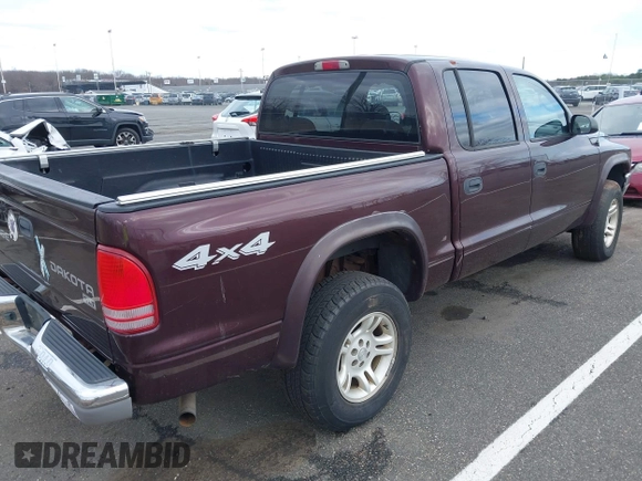 2004 Dodge Dakota SLT with VIN 1D7HG48NX4S751497, listed as a IAAI auction lot 41737935 with 106,064 mi miles. Bid and sale history available at carsss.com. Image 4.