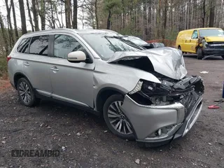 2020 Mitsubishi Outlander SE z VIN JA4AD3A38LZ041411, wystawiony jako IAAI lot #38871481 z przebiegiem 82 521 mil mil oraz . Historia ofert i sprzedaży dostępna na DreamBid. Obrazek 1.