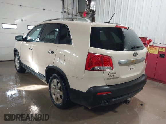 2012 Kia Sorento LX with VIN 5XYKTDA25CG226072, listed as a IAAI auction lot 41398669 with 229,218 mi miles. Bid and sale history available at carsss.com. Image 3.