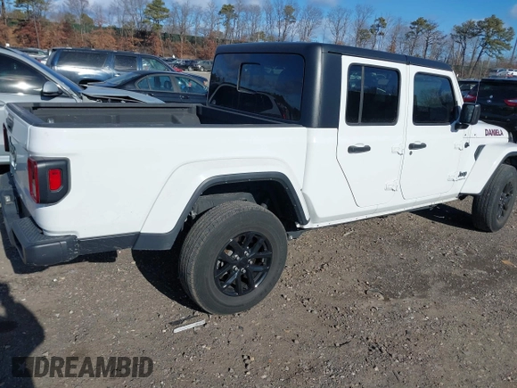 2022 Jeep Gladiator Willys with VIN 1C6HJTAG1NL117631, listed as a IAAI auction lot 41230291 with 33,463 mi miles and . Bid and sale history available at DreamBid. Image 4.