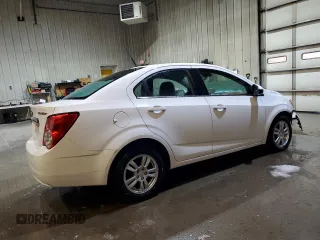 2013 Chevrolet Sonic LT with VIN 1G1JC5SB8D4164658, listed as a Copart auction lot 47059365 with 105,985 mi miles and Salvage Title. Bid and sale history available at DreamBid. Image 3.