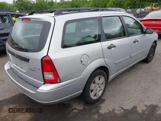 2006 Ford Focus SE z VIN 1FAFP36NX6W214578, wystawiony jako IAAI lot #42316813 z przebiegiem 127 331 mil mil oraz . Historia ofert i sprzedaży dostępna na DreamBid. Obrazek 4.