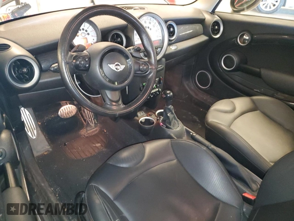 2014 MINI Clubman S z VIN WMWZG3C52ET800765, wystawiony jako Copart lot #76470874 z przebiegiem 103 971 mil mil oraz Szkoda całkowita • Salvage title. Historia ofert i sprzedaży dostępna na DreamBid. Obrazek 8.