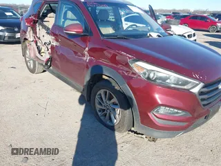 2016 Hyundai Tucson Sport with VIN KM8J33A24GU107371, listed as a IAAI auction lot 41223149 with 115,715 mi miles. Bid and sale history available at carsss.com. Image 6.