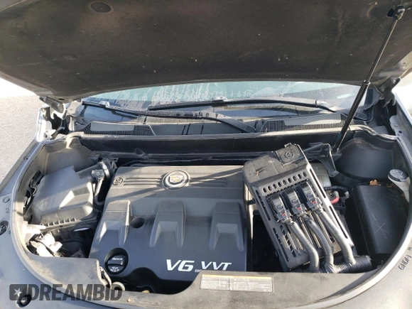 2012 Cadillac SRX Performance Collection z VIN 3GYFNBE3XCS611543, wystawiony jako Copart lot #56628975 z przebiegiem 61 825 mil mil oraz Szkoda całkowita • Salvage title. Historia ofert i sprzedaży dostępna na DreamBid. Obrazek 12.