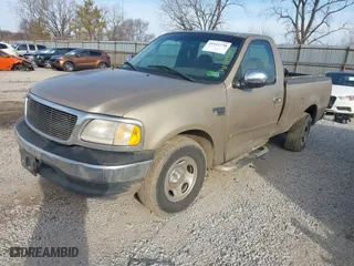 1999 Ford F-150 Work Series with VIN 1FTRF17W9XNB77925, listed as a IAAI auction lot 41511738 with 136,735 mi miles. Bid and sale history available at carsss.com. Image 17.